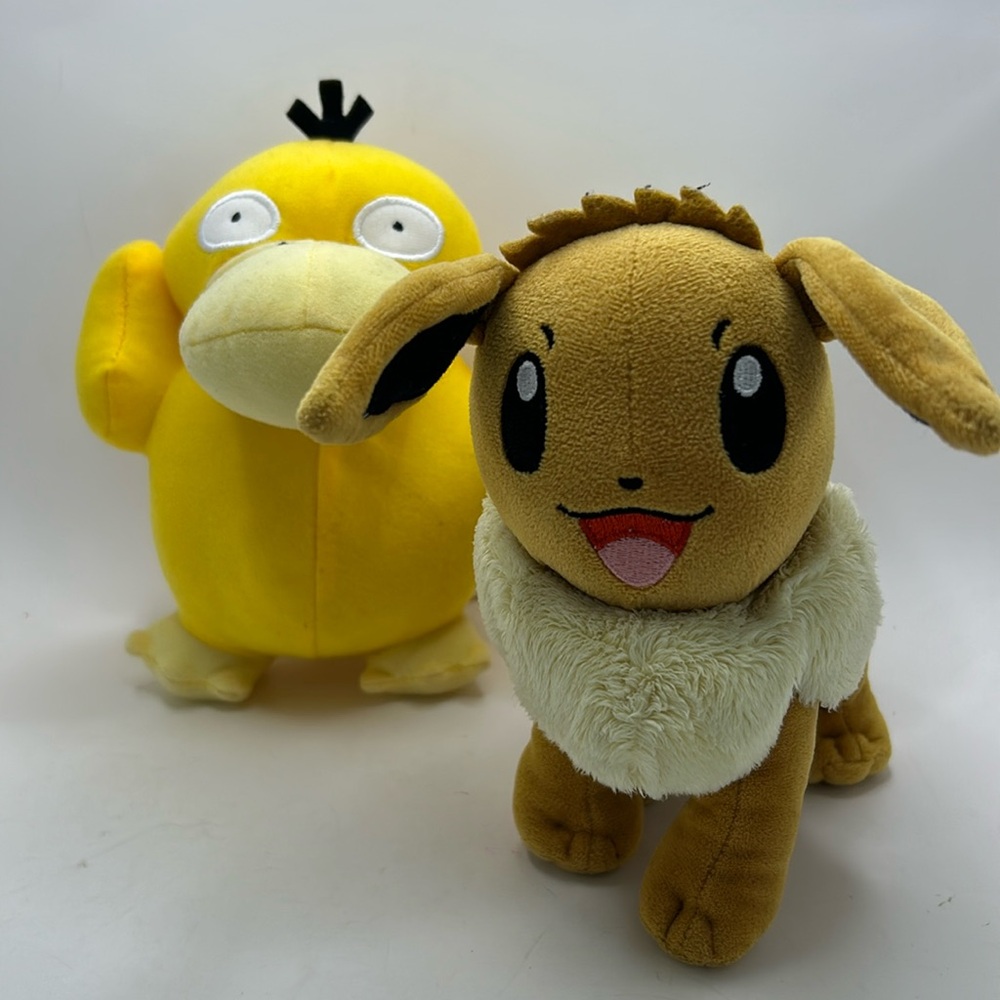 Pokemon plushies psyduck and eevee 7”